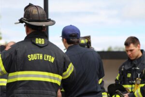 Firefighters gather in safety gear
